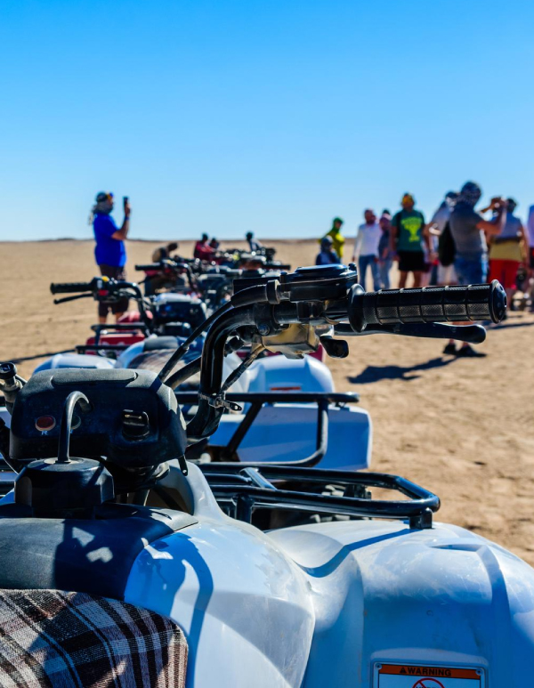 Quad biking in open desert